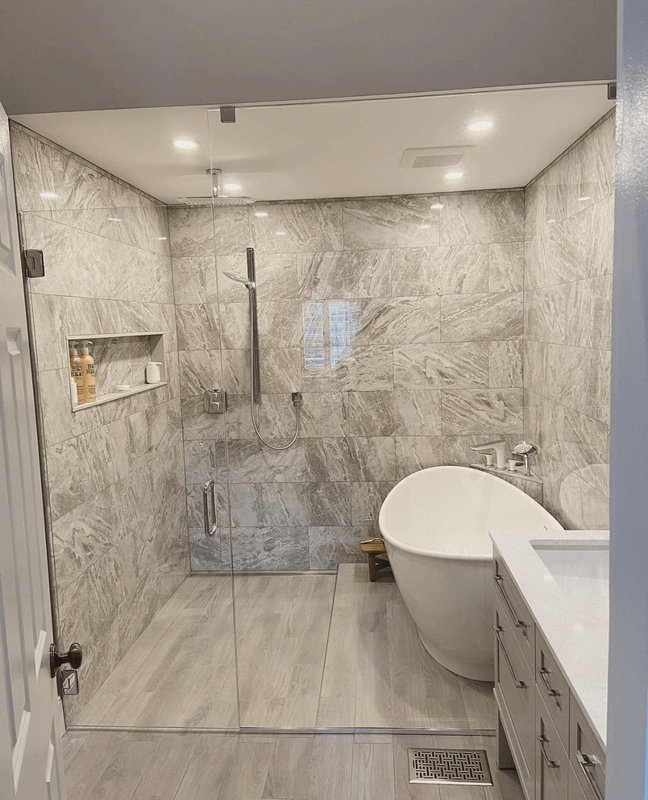 picture of a walk in shower and bath tub